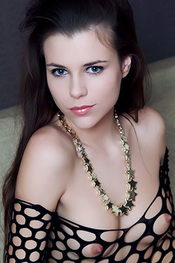 Jasna in Fishnet Bodysuit via Errotica-Archives